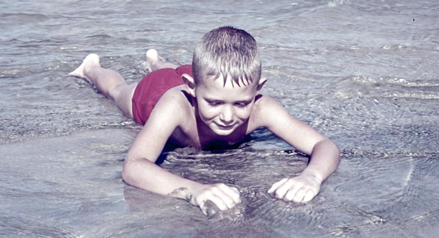 Boy in surf.
